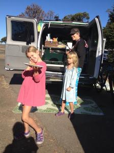 Cooking breakfast from the back of the van.